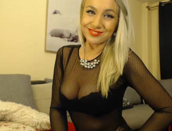 Blonde webcam model smiling and teasing live